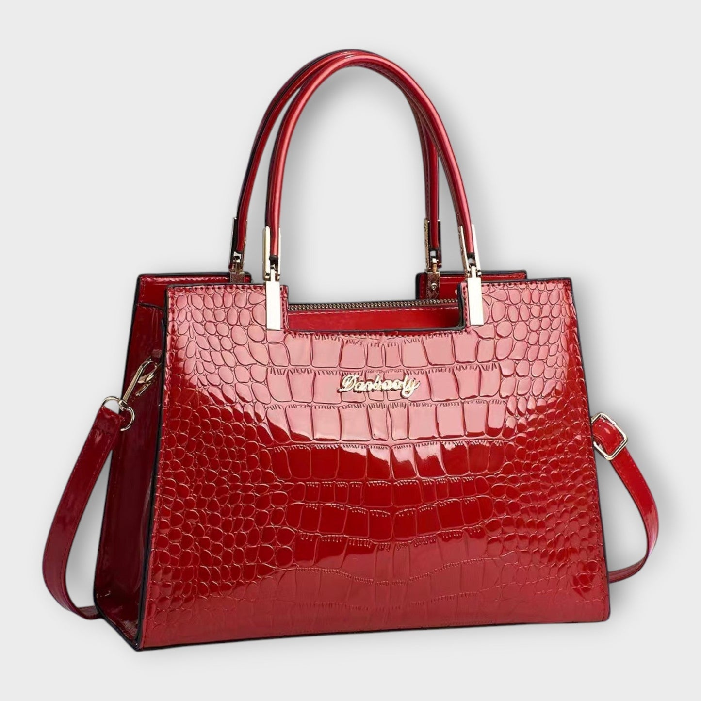Sac à main en motif crocodile brillant pour occasions chics